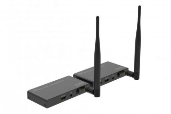 Digitus Wireless HDMI Extender/Splitter-set, stilren svart design. Svarta trådlösa HDMI-sändare och -mottagare, två höga antenner, fotograferade från sidan på ett bord.